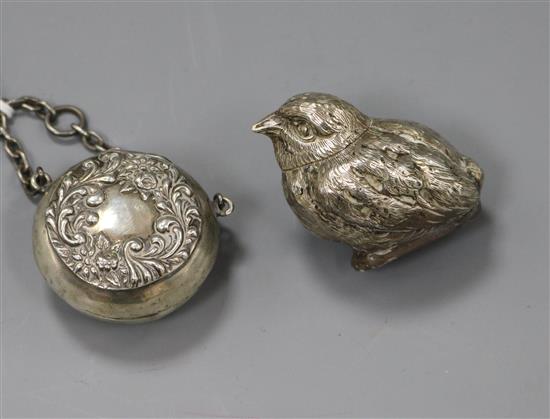 A Victorian novelty silver pepper pot, in the form of a wren, London, 1881 and an Edwardian silver pill box, on a chain.